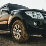 black suv on gray concrete road